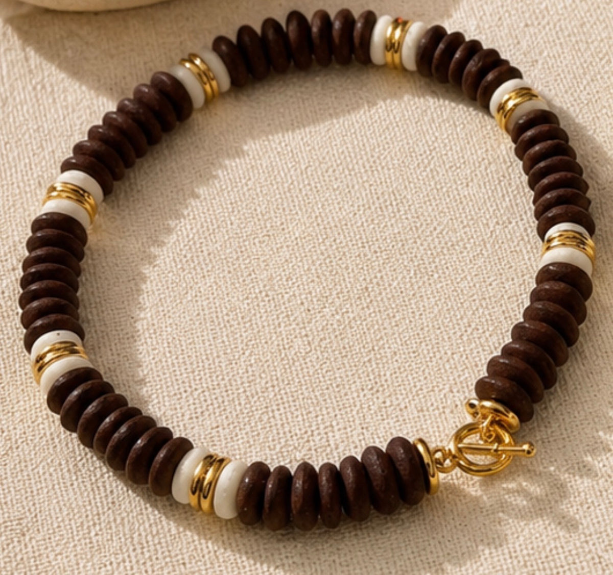 Brown and gold collar